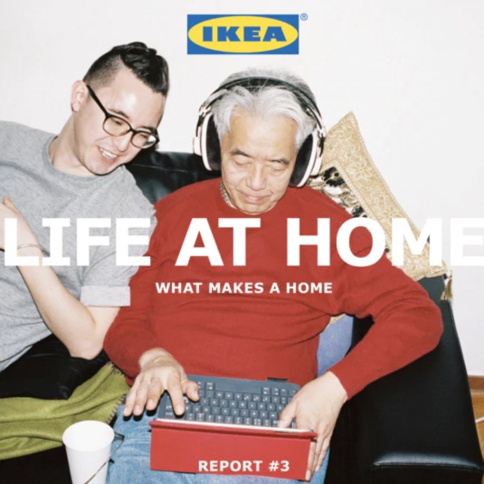 Report cover, featuring two asian men looking at a laptop on a sofa smiling