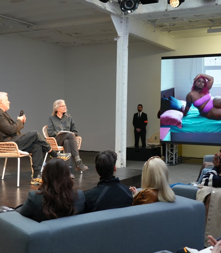Annie Leibovitz and Marcus Engman on stage at the exhibition.